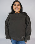 Ashlie is wearing a size XL