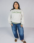 Ashlie is wearing a size XL