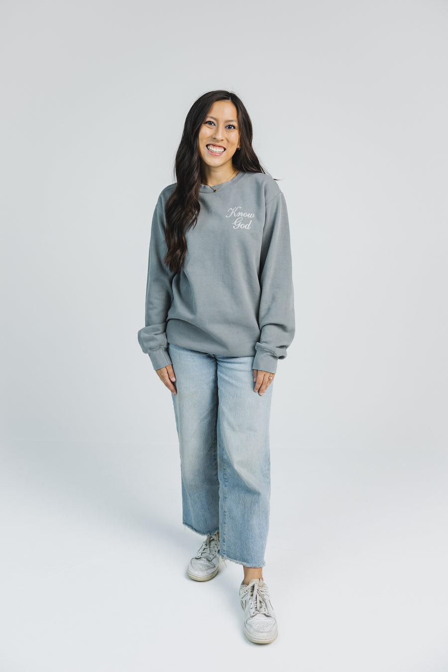 Dami is wearing a size M
