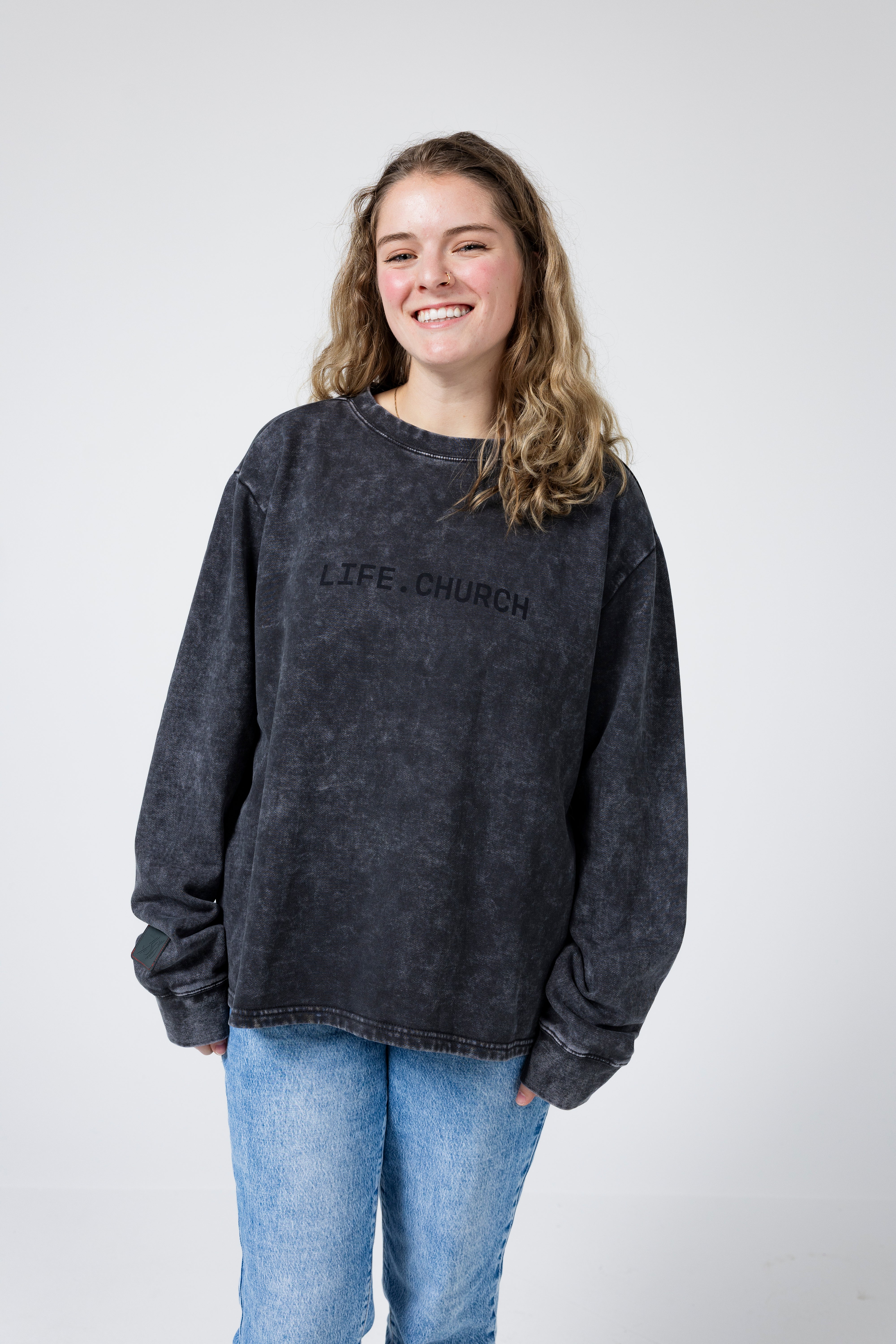 Ella is wearing a size L