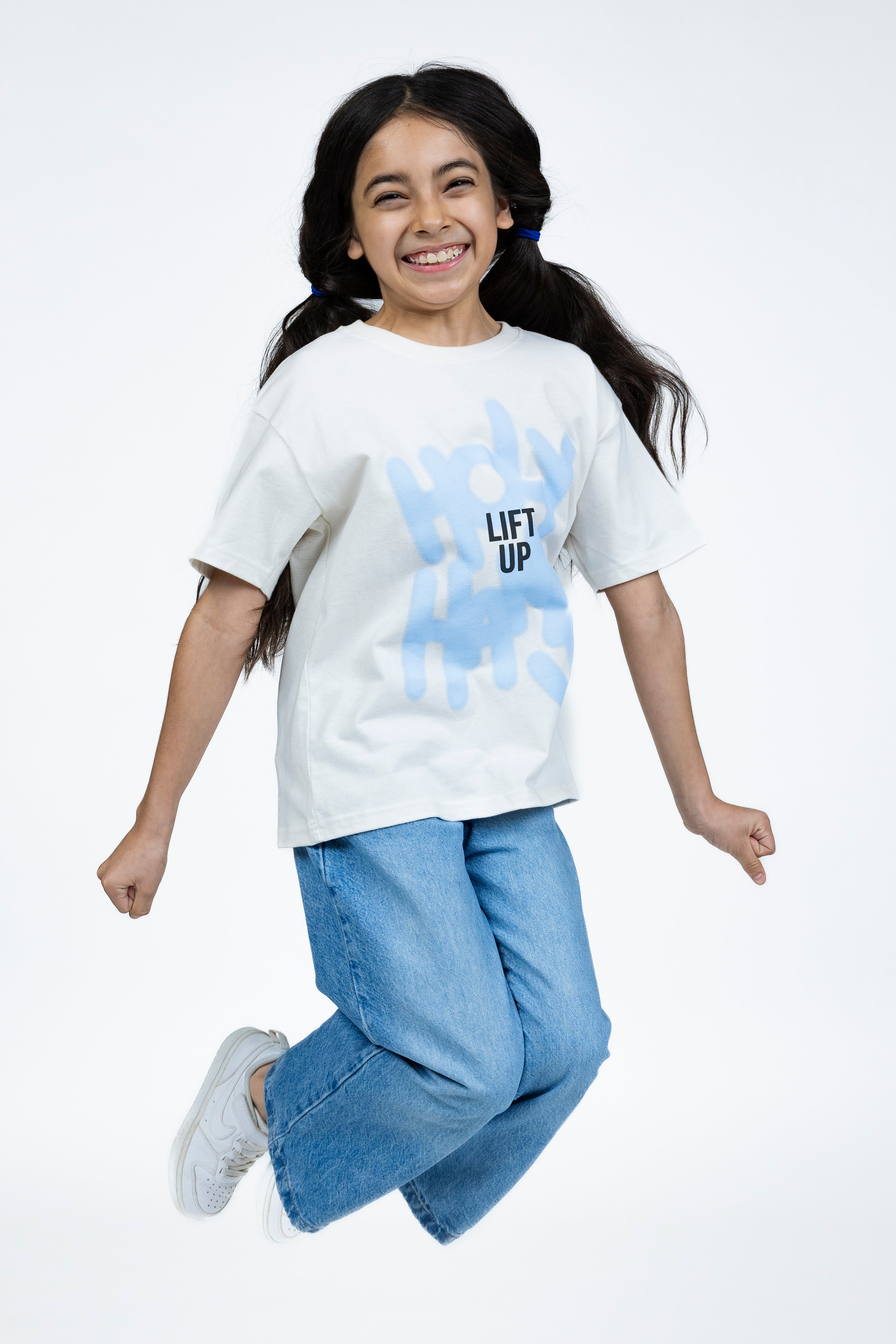 Penelope is wearing size Youth L