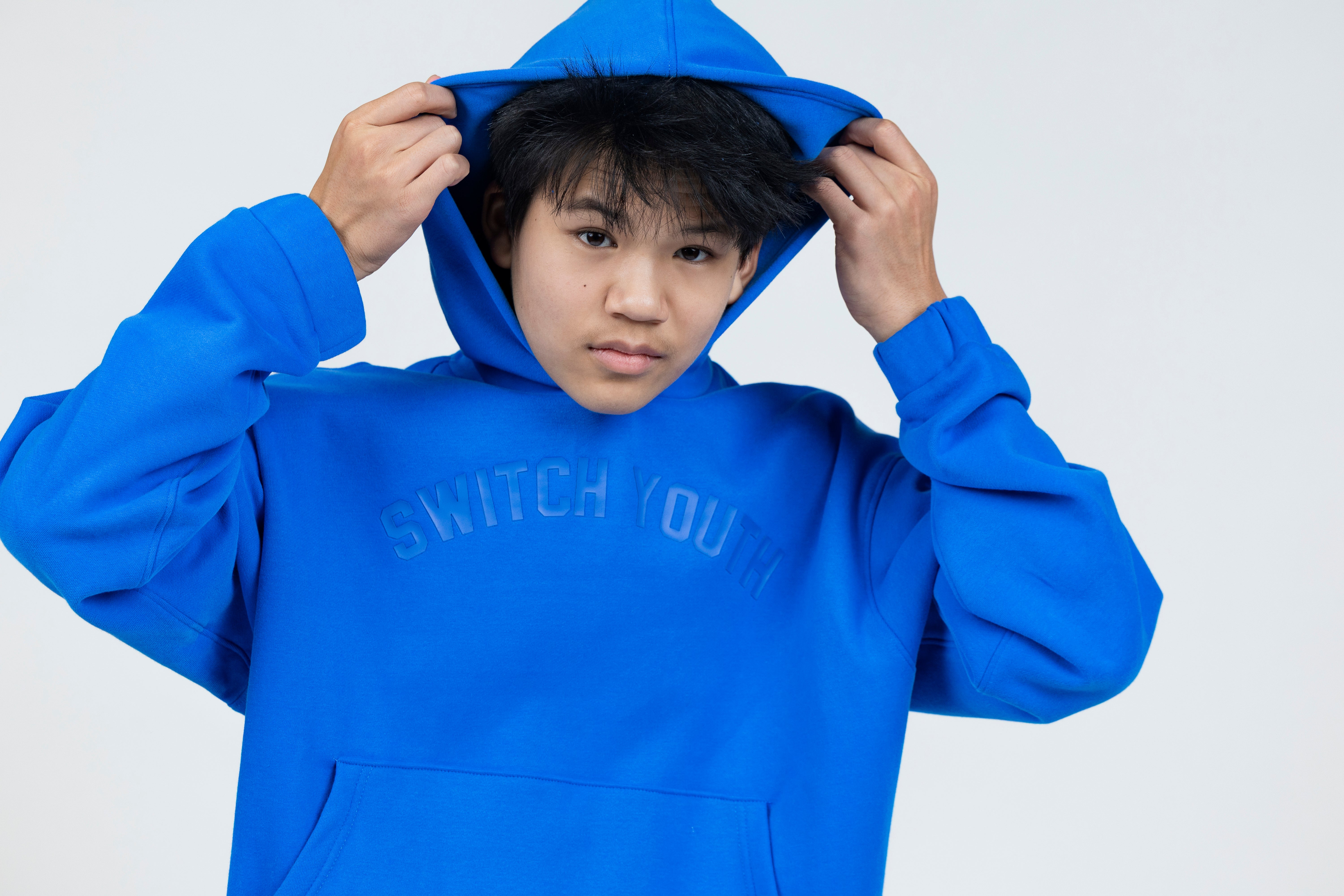 Brayden is wearing a size XS