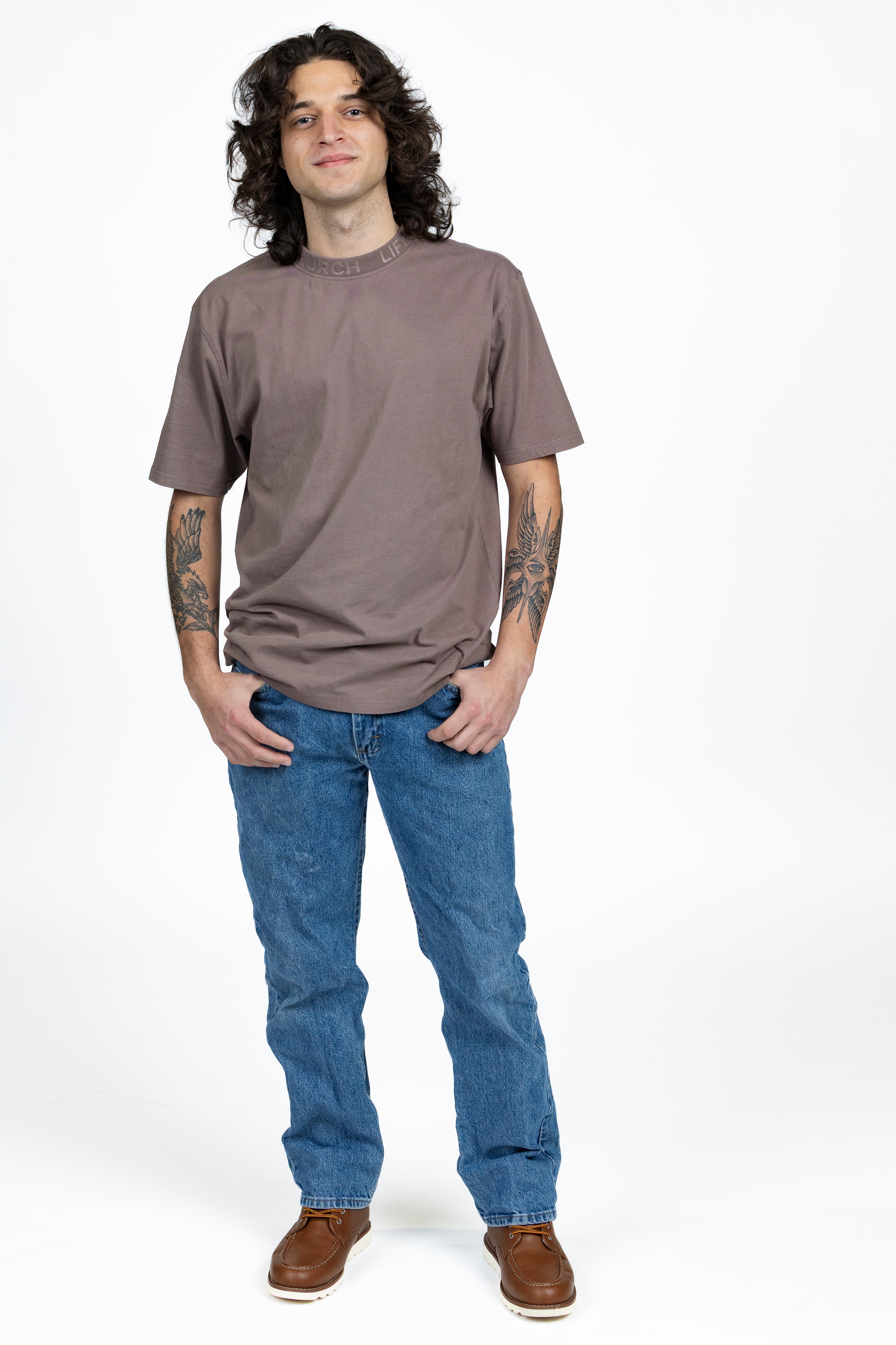 Boston is wearing a size L