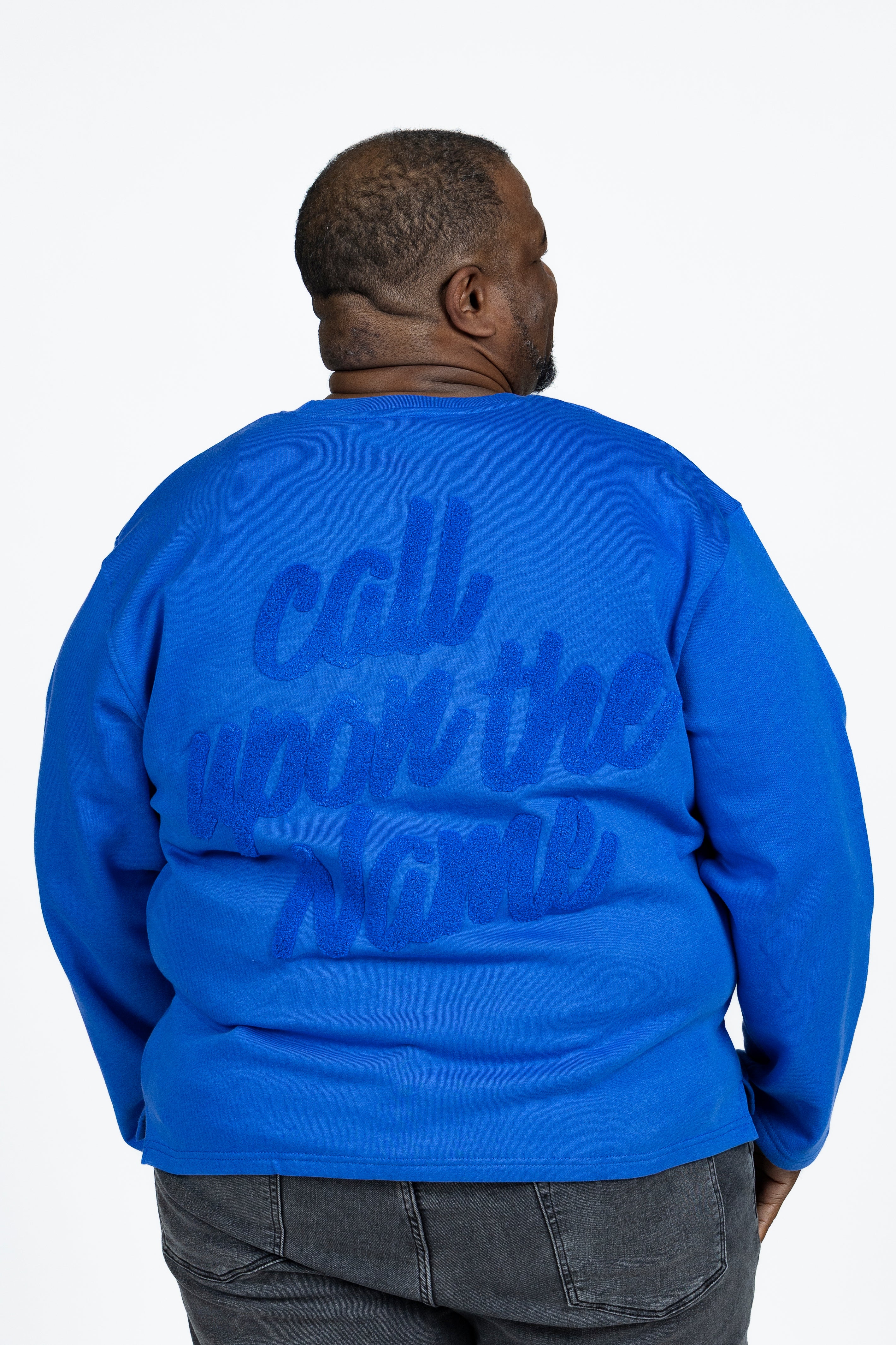 Christopher is wearing a size 3XL 