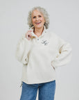 Linda Jo is 5'4" and wears a size S