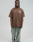 Keedron is 5'6" and wears a size M