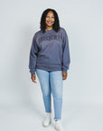 Aarikah is wearing a size L