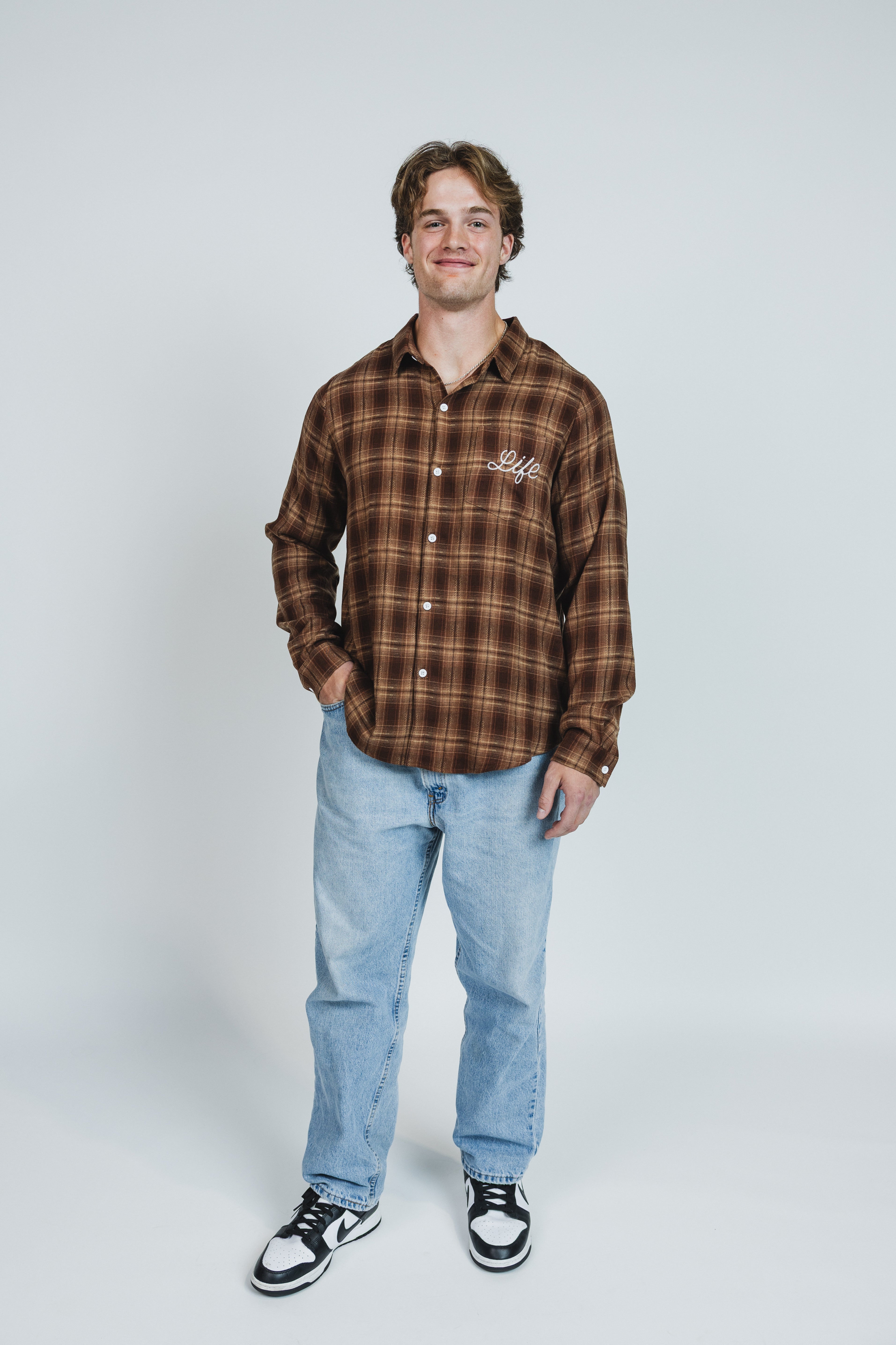 Mikah is wearing a size XL