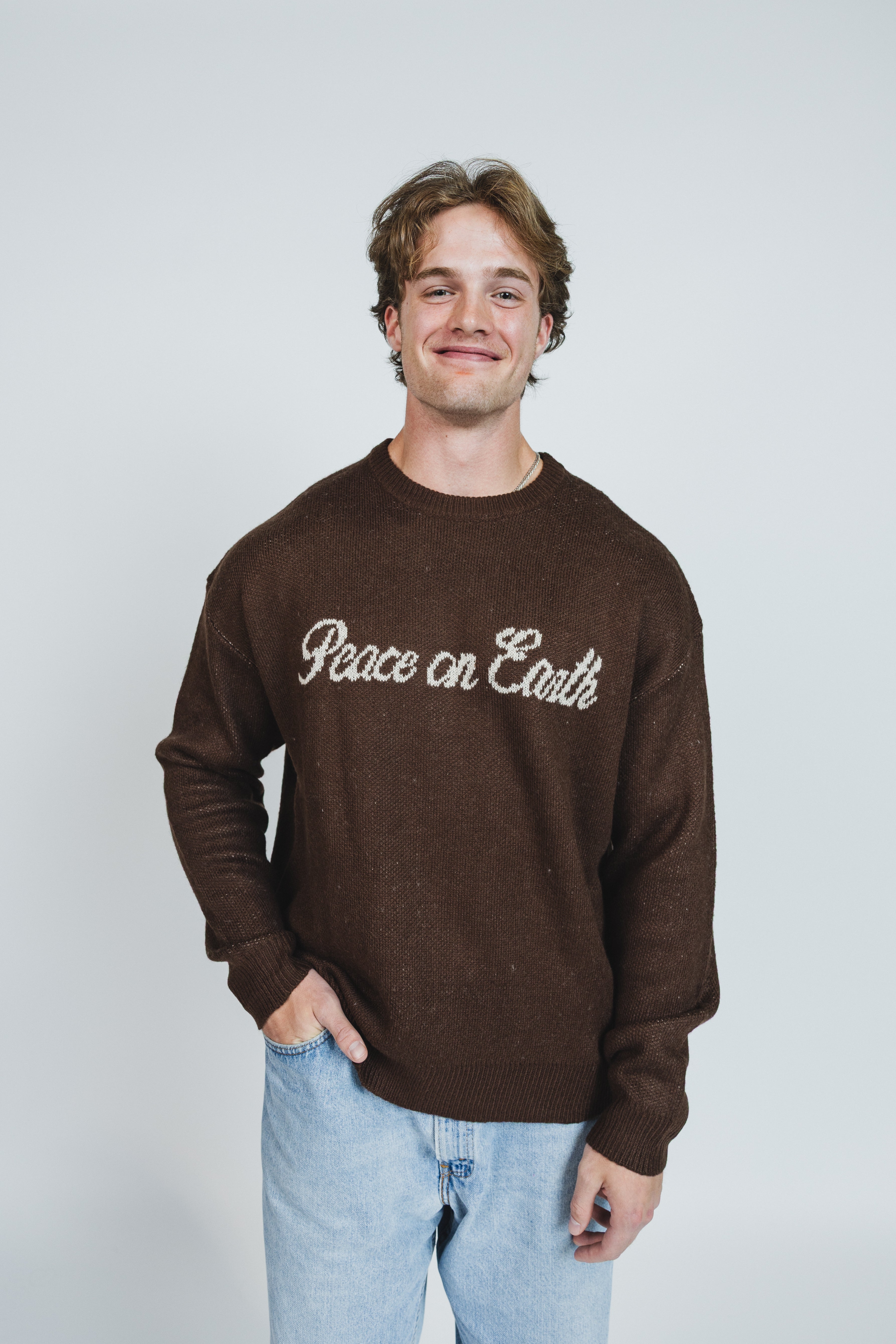 Mikah is wearing a size XL