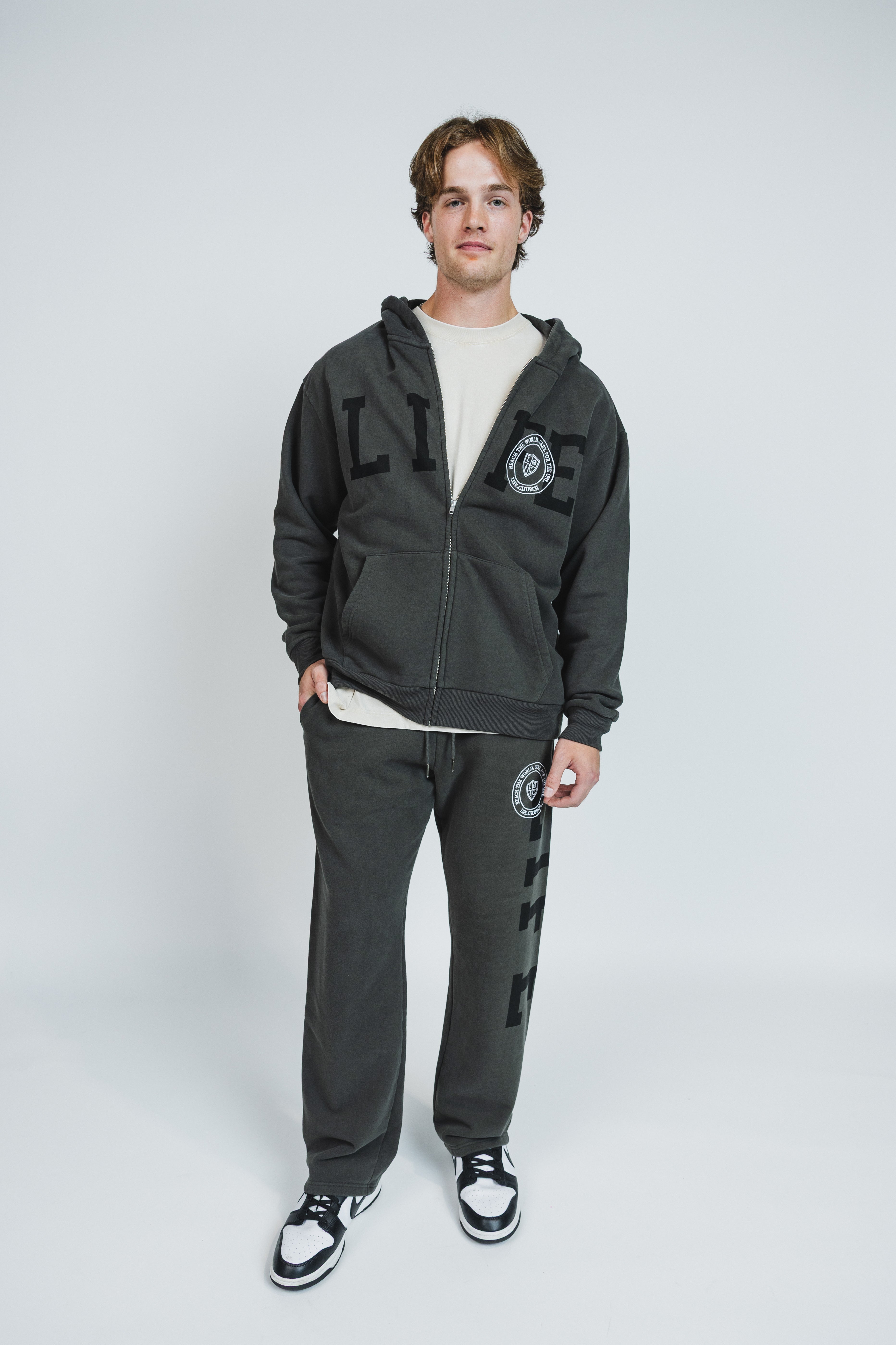 Mikah is wearing a size XL