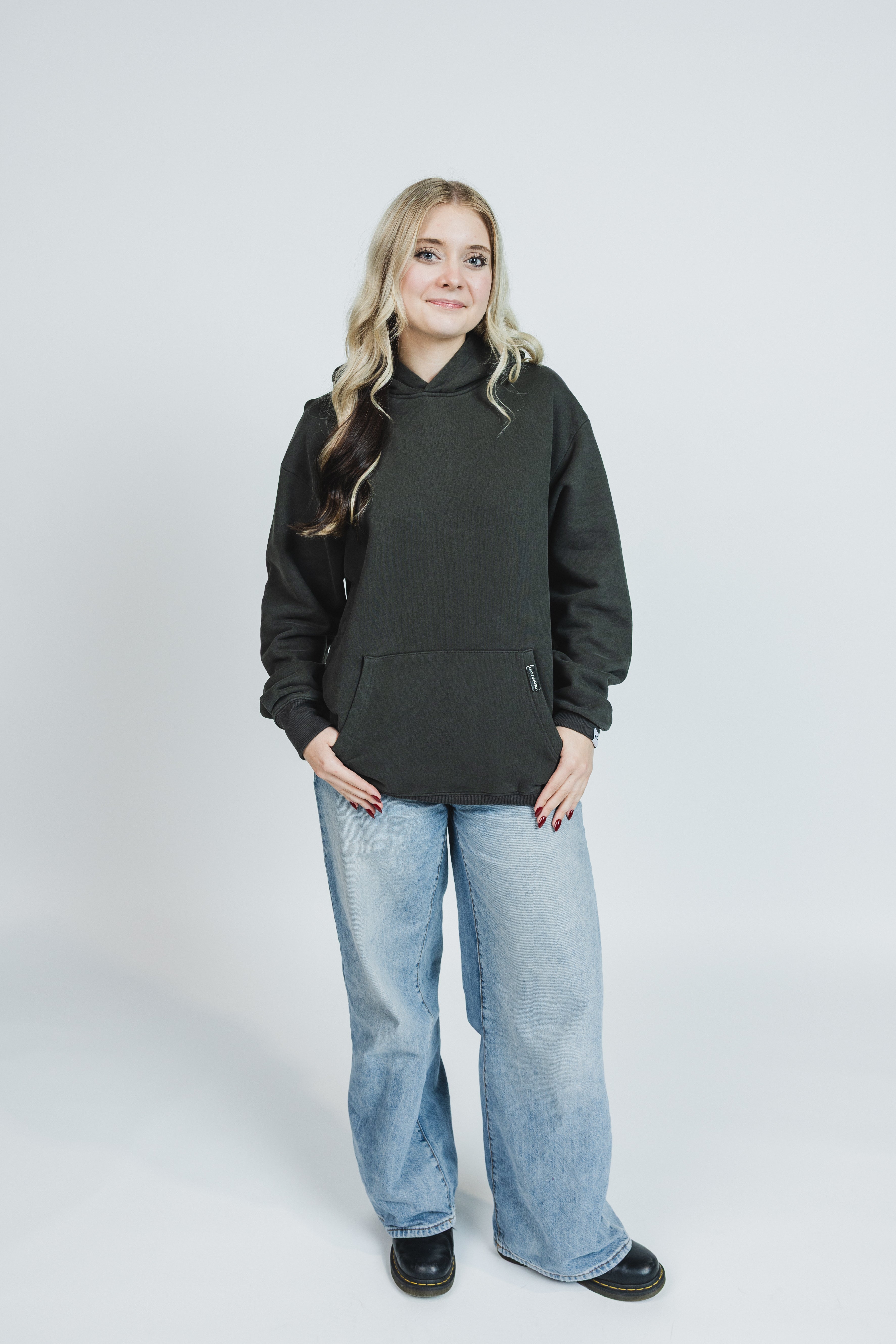 Maddie is wearing a size M