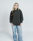 Maddie is wearing a size M