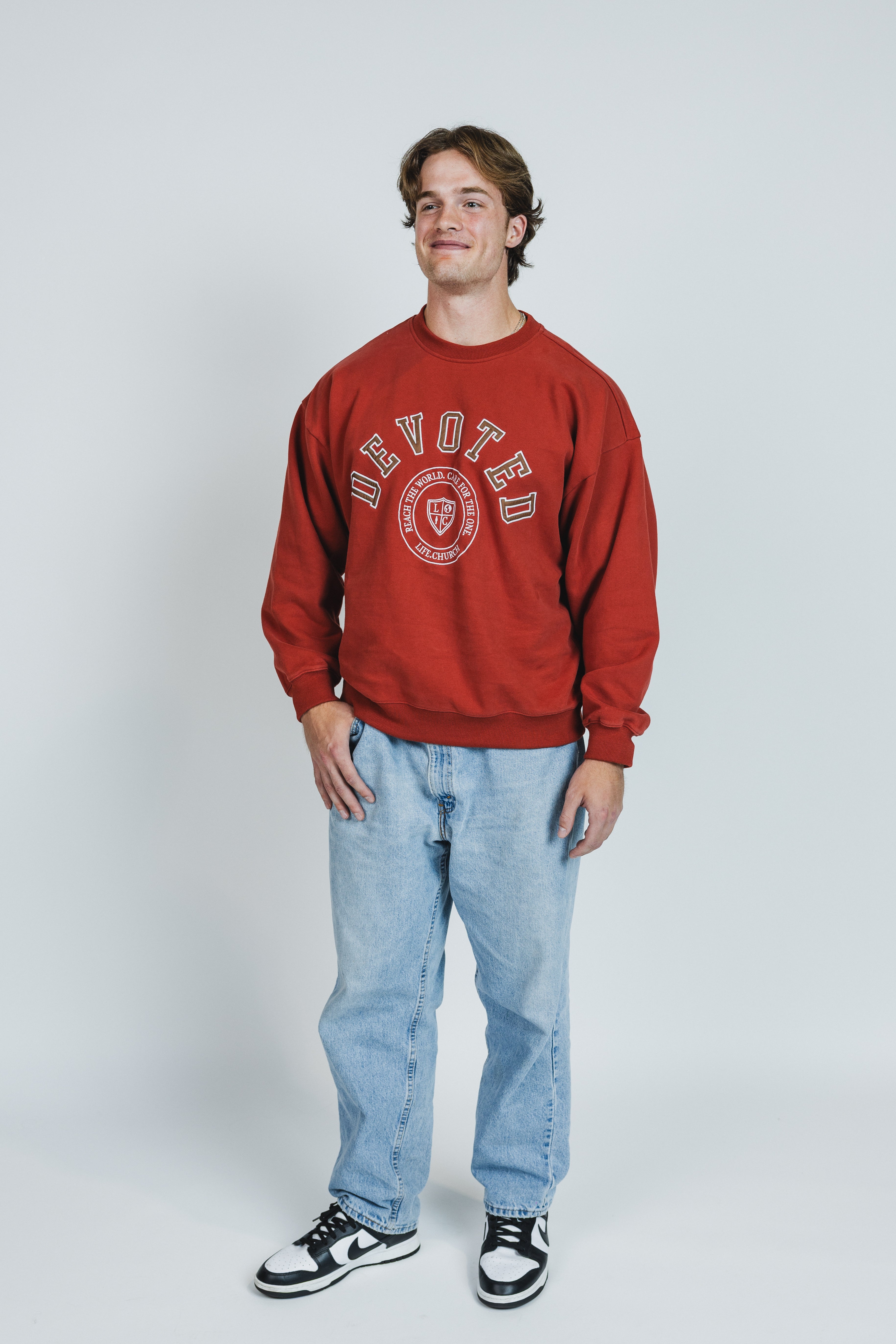 Mikah is wearing a size XL